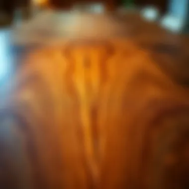 Close-up of the intricate wood grain on a large square dining table