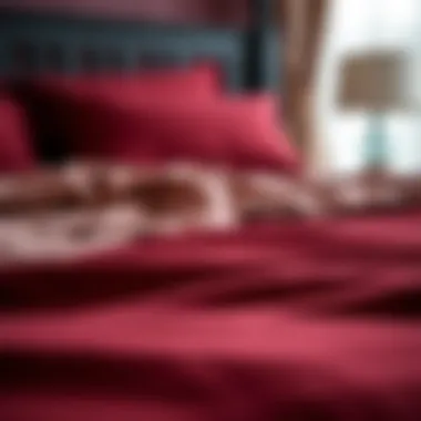 Close-up of rich maroon fabric textures in bedding