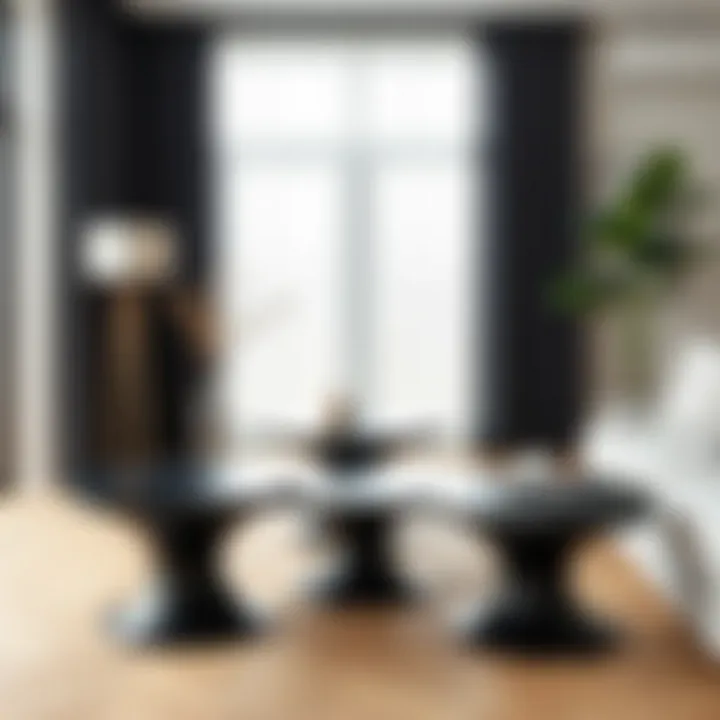 Round black end tables paired with contemporary furniture