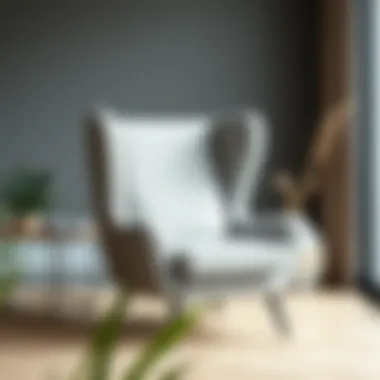 Light grey wingback chair in a minimalist interior design