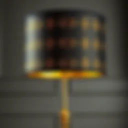 Elegant black drum lamp shade with intricate gold lining pattern