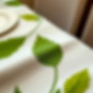 Close-up of textured fabric featuring green leaf designs