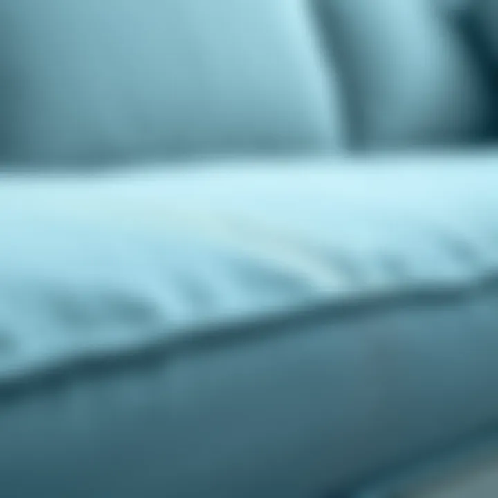 Close-up of light blue fabric on a sleeper sofa