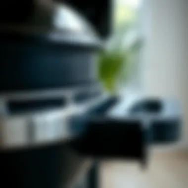 Close-up of a small grill demonstrating its side burner feature