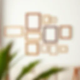 Elegant arrangement of thin brown picture frames on a minimalist wall.