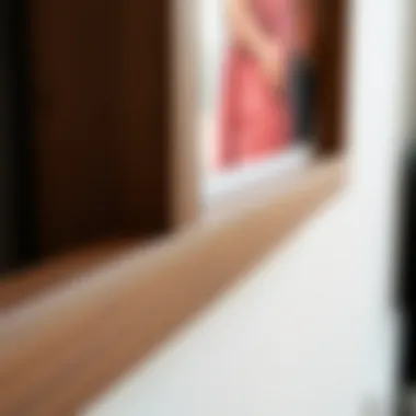 Close-up view showcasing the texture and finish of a thin brown picture frame.