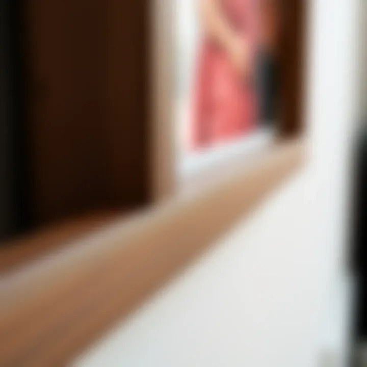 Close-up view showcasing the texture and finish of a thin brown picture frame.