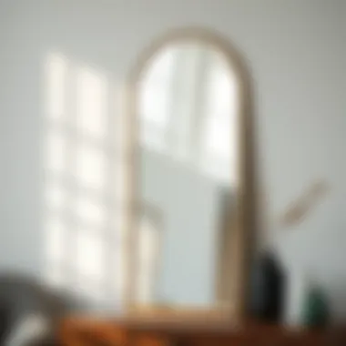 Artistic free standing wall mirror reflecting natural light