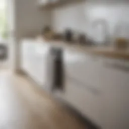 Sleek under counter towel rack in modern kitchen setting