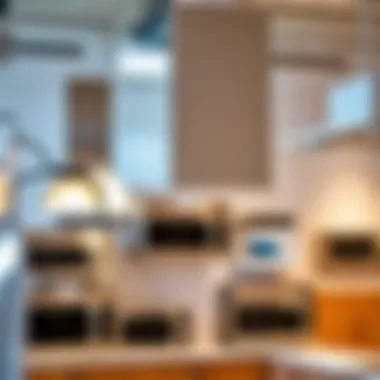 Different styles of microwave vent hoods displayed in a showroom setting